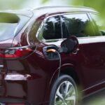 17-cx-80-ext-phev-charging-artisanred-int-premiummodern-whitenappaleather-l